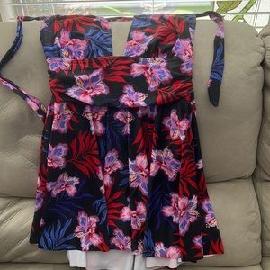 New, never worn Swimsuit dress. I piece. Halter style that ties in back